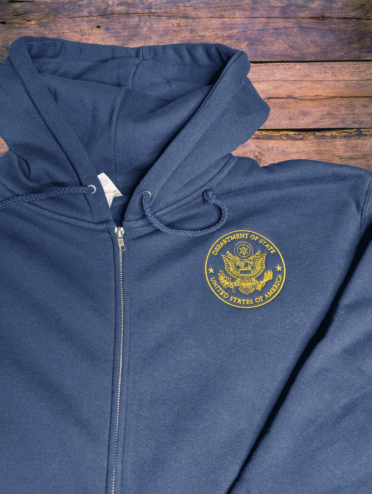 Independent Trading Company® Hoodie With Gold Embroidered Seal: Global